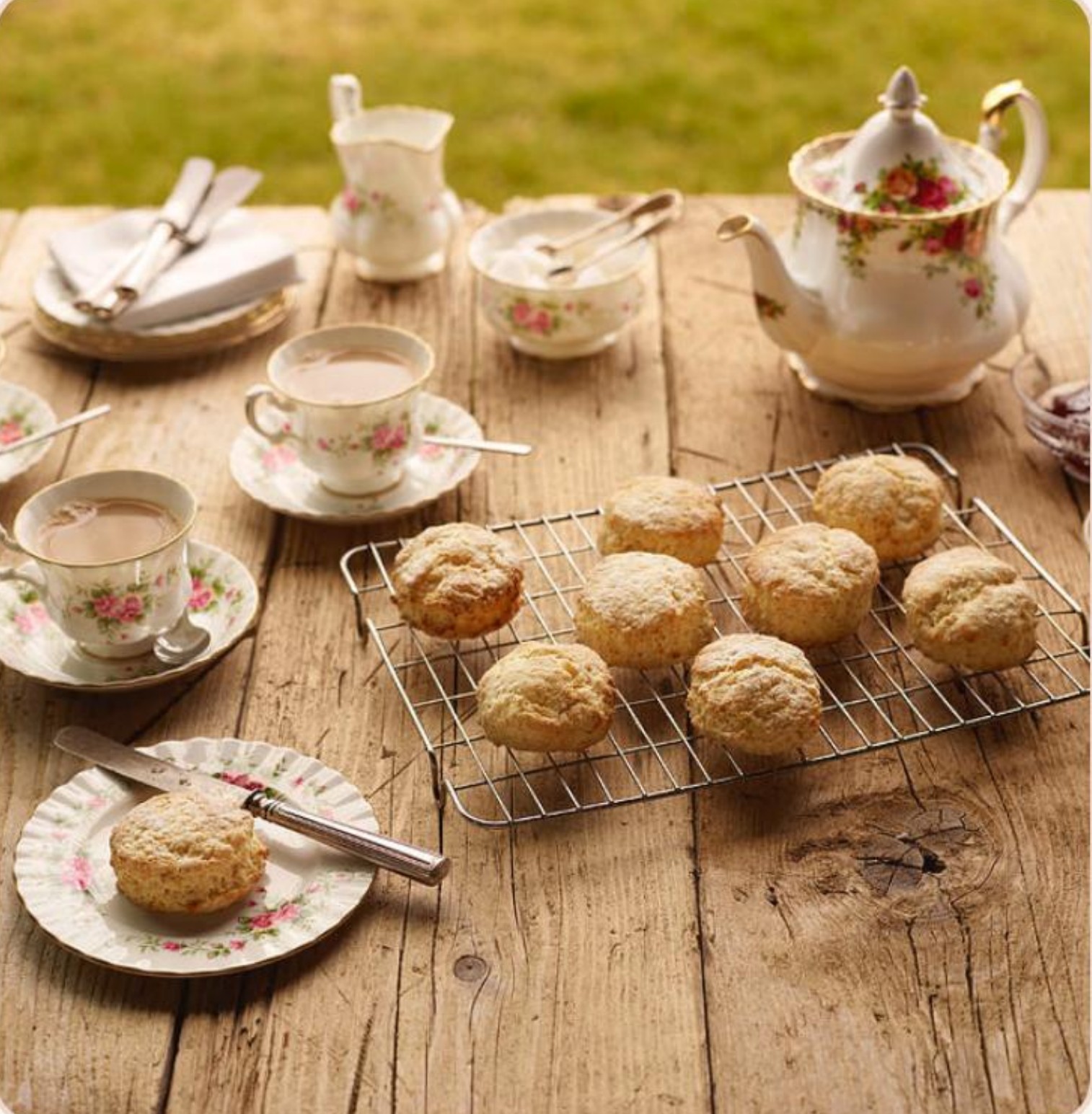 Scones and a floral tea set featured in the Sophisti-Cake menu